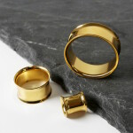 Gold double flared Stahl Flesh Tunnel 10 mm