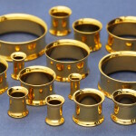 Gold double flared Stahl Flesh Tunnel 10 mm